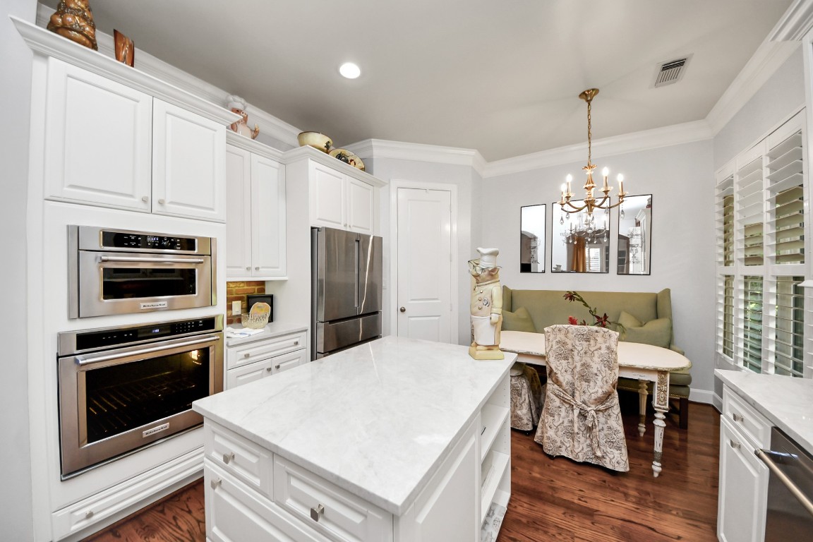 6302 Hermann Lake Drive Houston, TX 77021 - Photo 18 of 50 a kitchen with stainless steel appliances a stove refrigerator sink and microwave