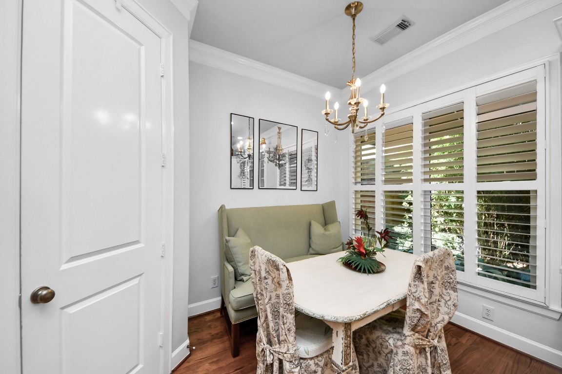 6302 Hermann Lake Drive Houston, TX 77021 - Photo 22 of 50 a view of a dining room with furniture window and wooden floor