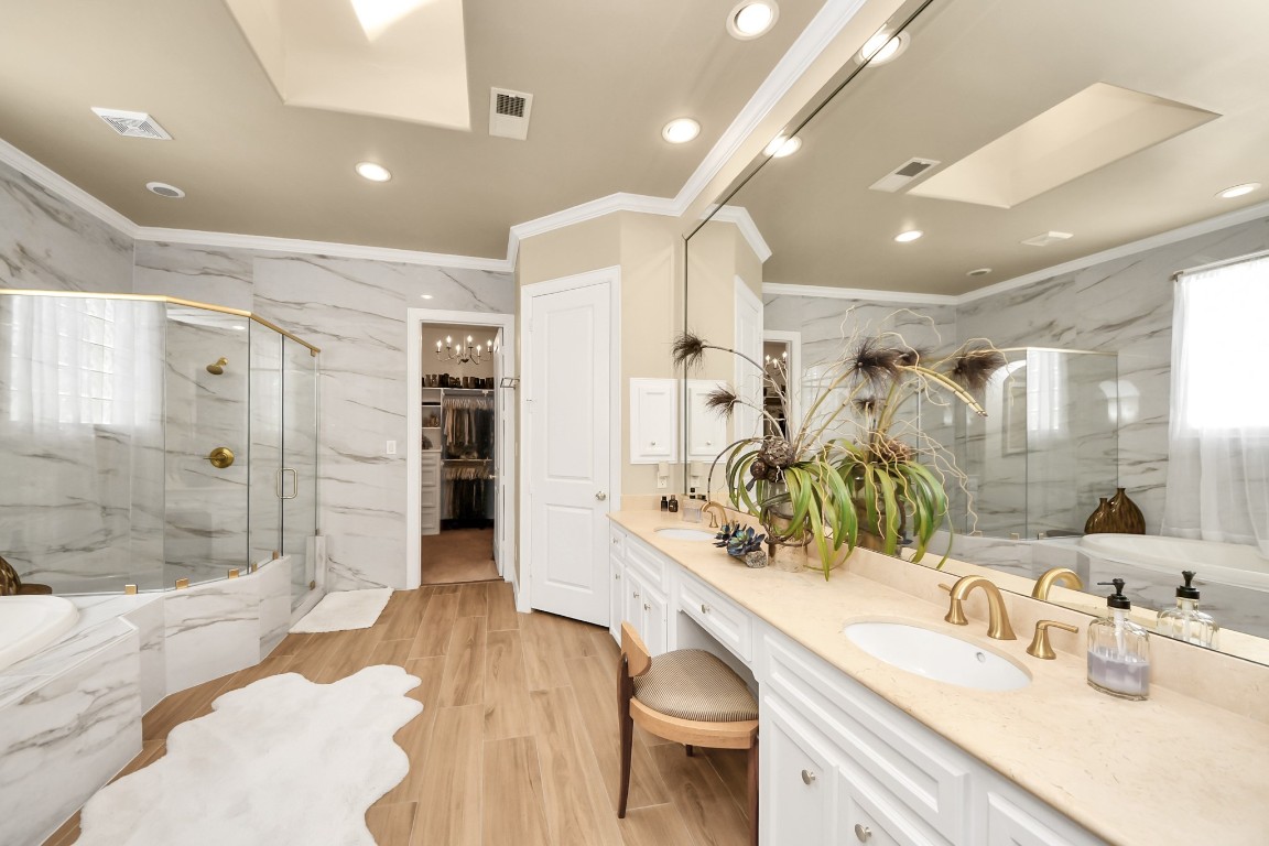 6302 Hermann Lake Drive Houston, TX 77021 - Photo 28 of 50 a bathroom with double vanity sinks a shower and a mirror