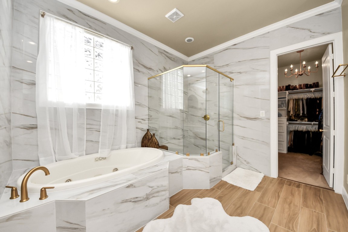 6302 Hermann Lake Drive Houston, TX 77021 - Photo 29 of 50 a bathroom with a bathtub and a shower