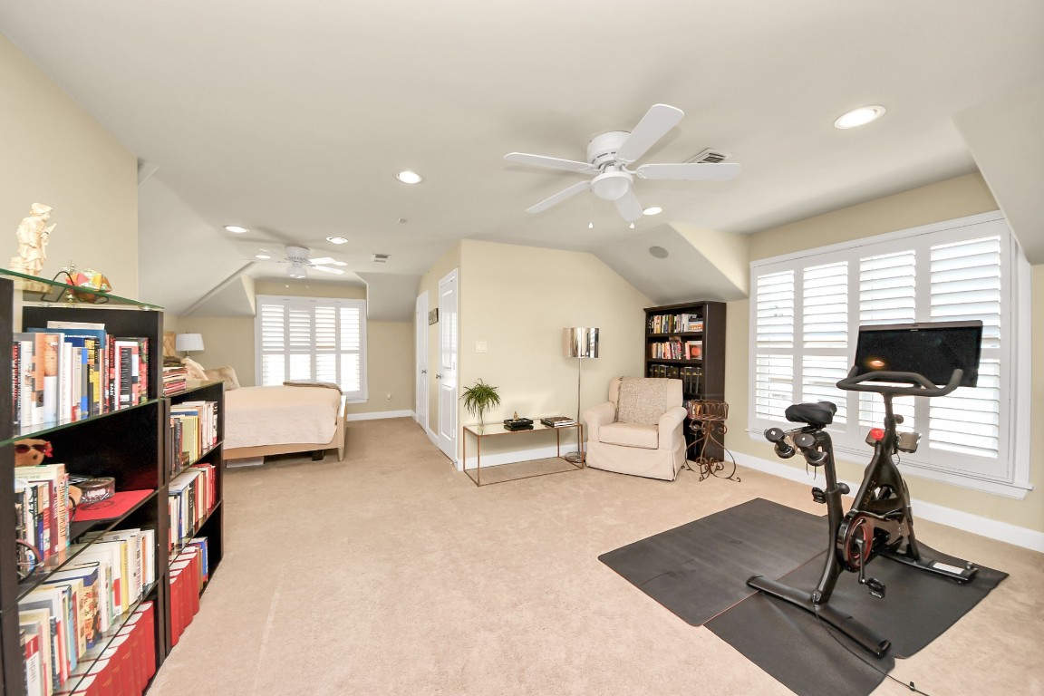 6302 Hermann Lake Drive Houston, TX 77021 - Photo 37 of 50 a living room with furniture and a flat screen tv