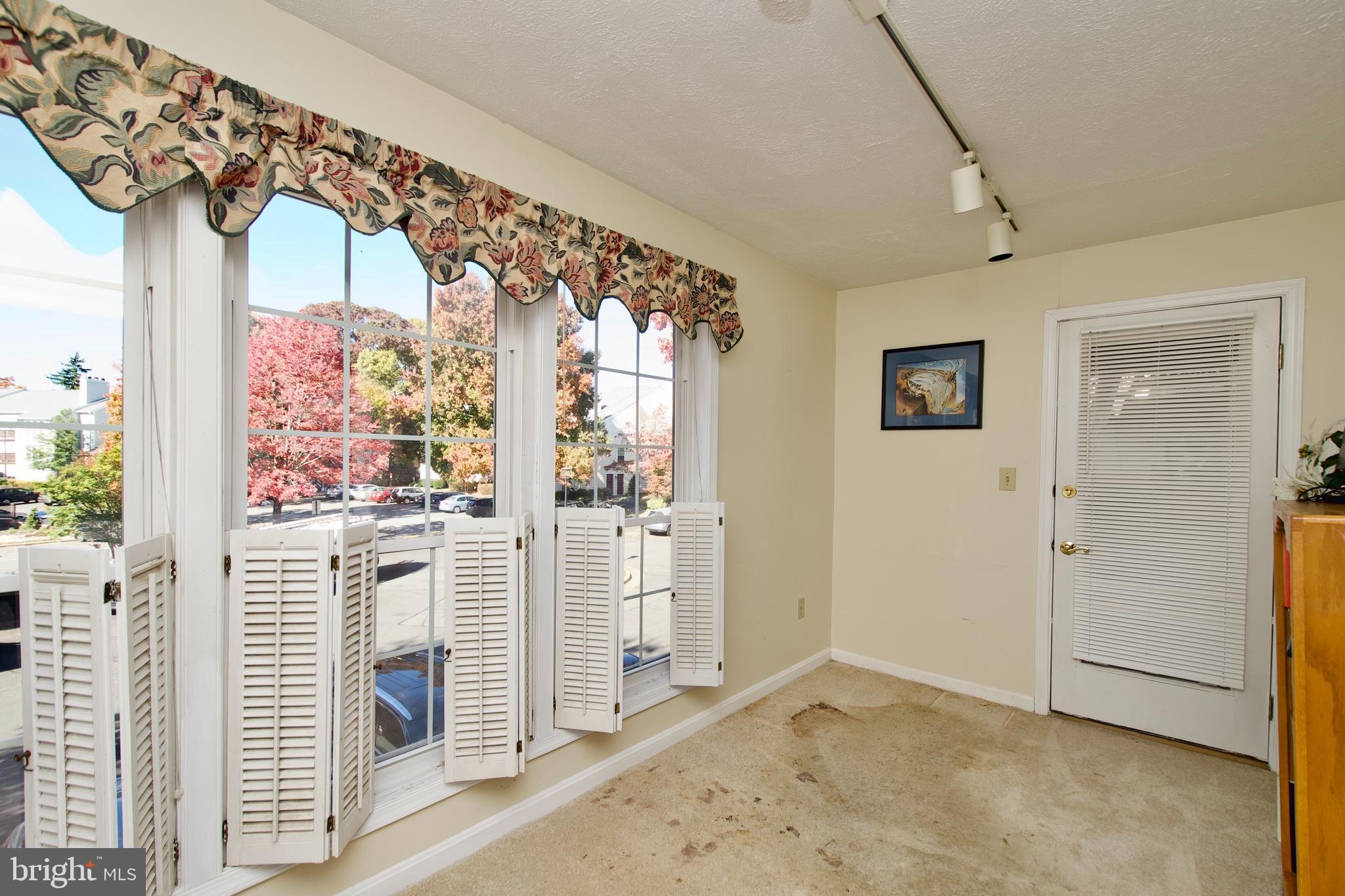 10066 Oakton Terrace Road, Unit 10066 Oakton, VA 22124 - Photo 22 of 35 Sunroom