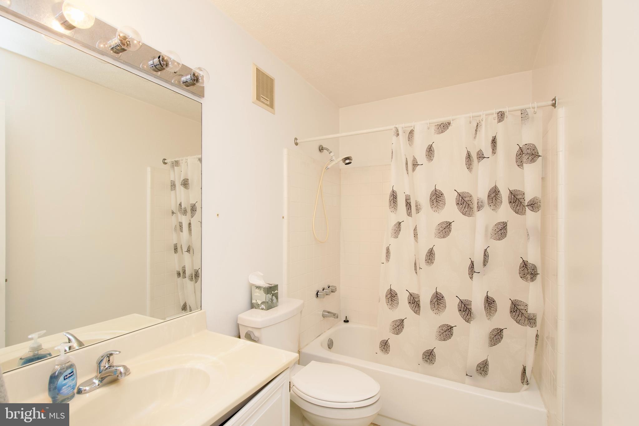 10066 Oakton Terrace Road, Unit 10066 Oakton, VA 22124 - Photo 25 of 35 One of two full baths