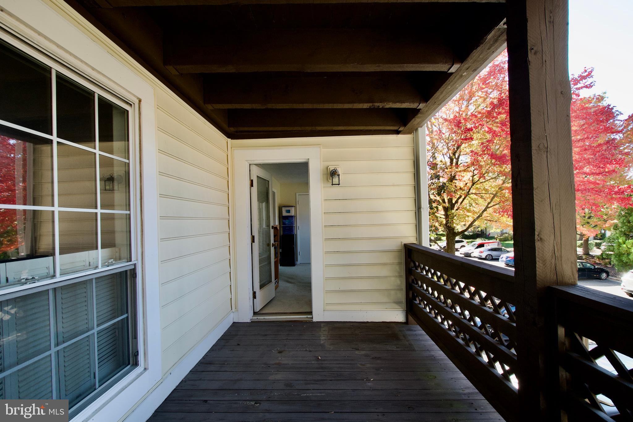 10066 Oakton Terrace Road, Unit 10066 Oakton, VA 22124 - Photo 35 of 35 Balcony to sunroom