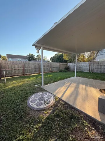 a view of a backyard with a garden