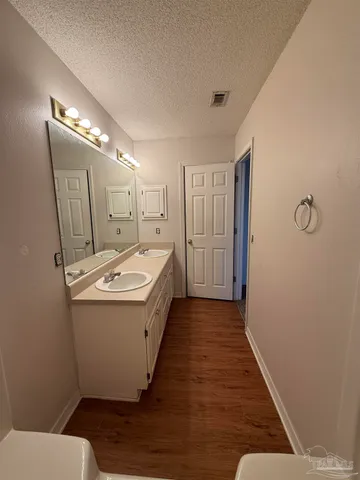 a view of hallway with washer and dryer