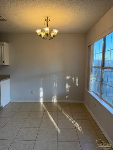 a view of a livingroom with a chandelier