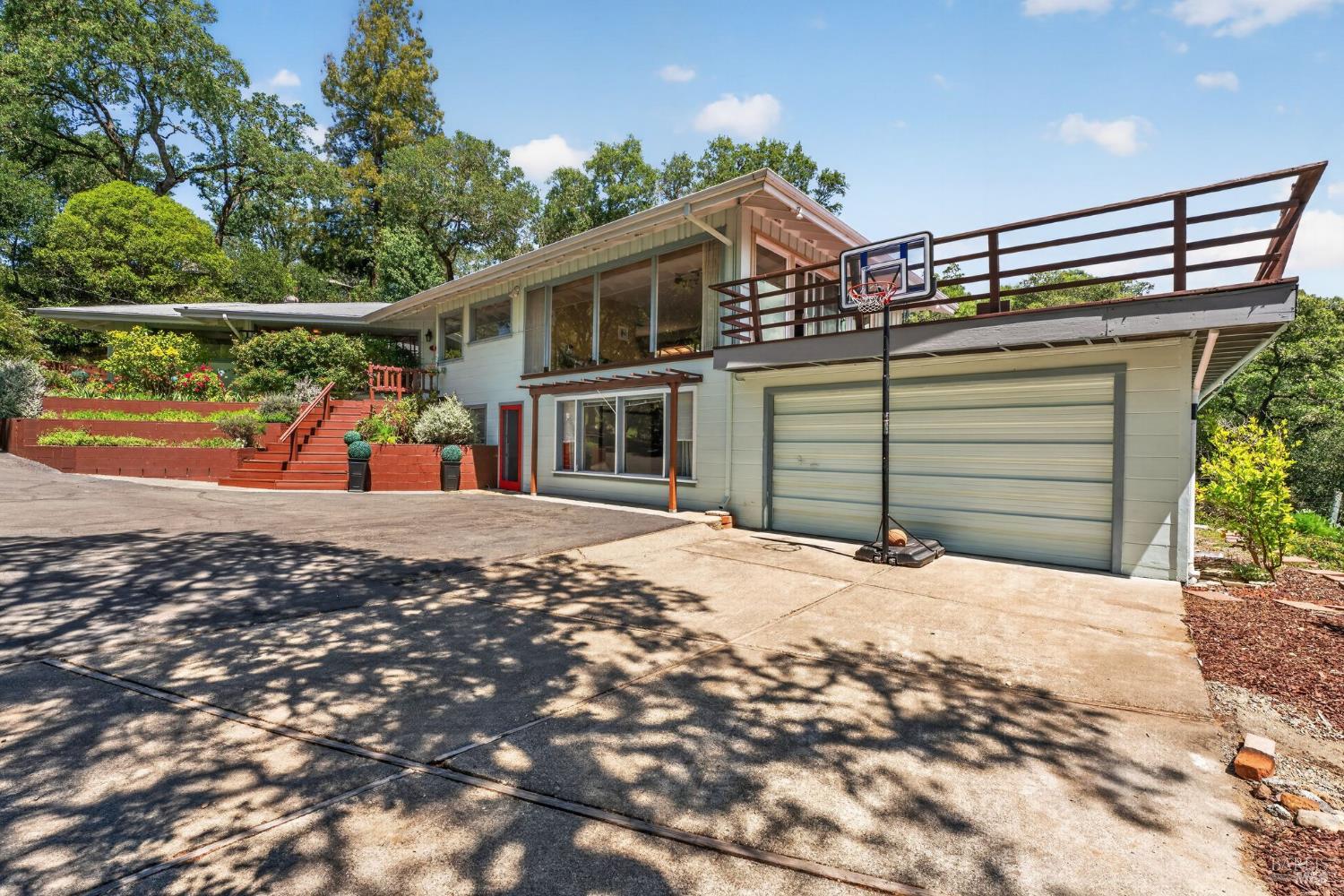 891 Isola Way Ukiah, CA 95482 - Photo 1 of 46 a view of a house with a snow on the road