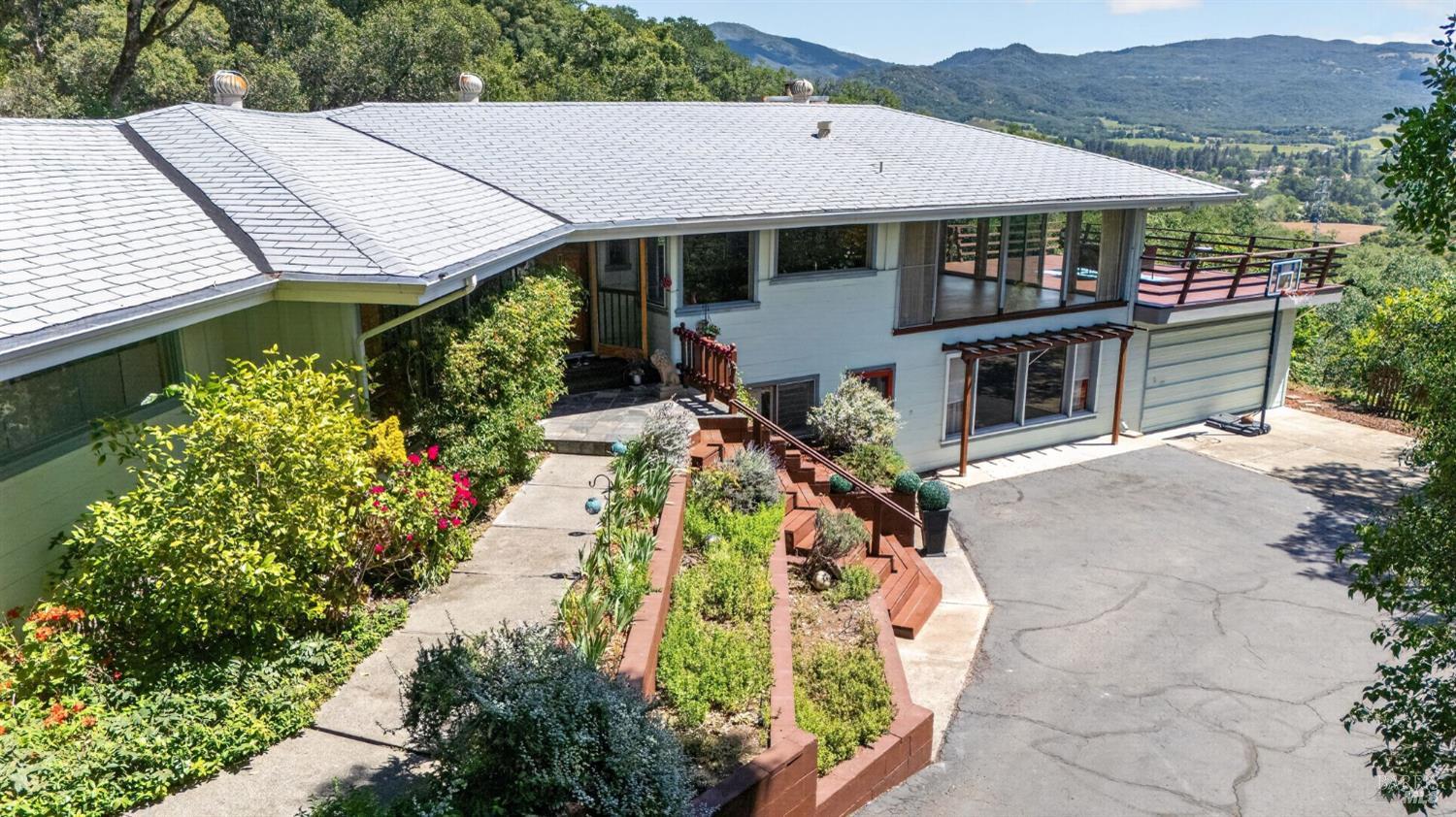891 Isola Way Ukiah, CA 95482 - Photo 16 of 46 a aerial view of a house with a yard and potted plants