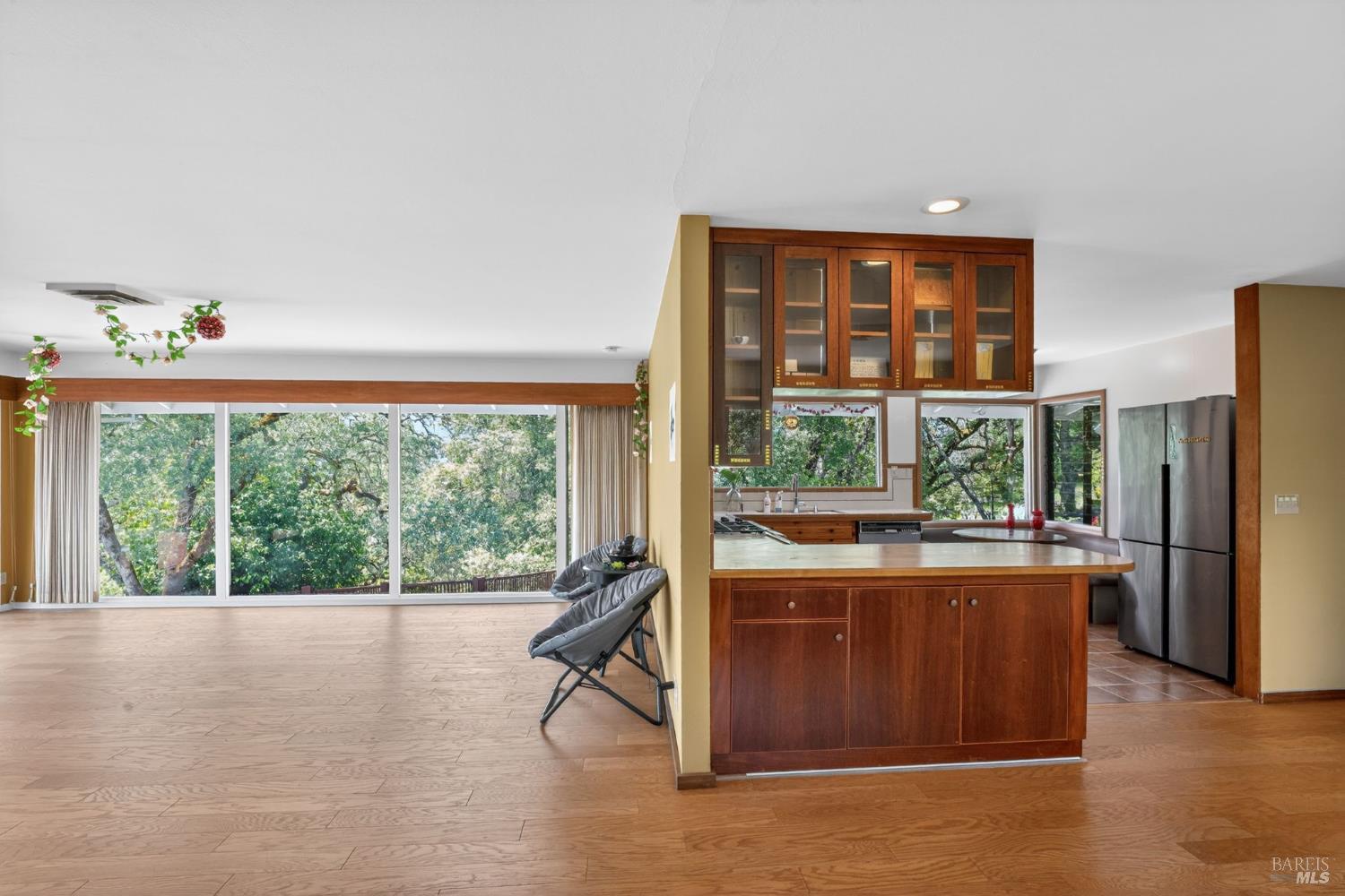 891 Isola Way Ukiah, CA 95482 - Photo 29 of 46 a view of a living room and a floor to ceiling window