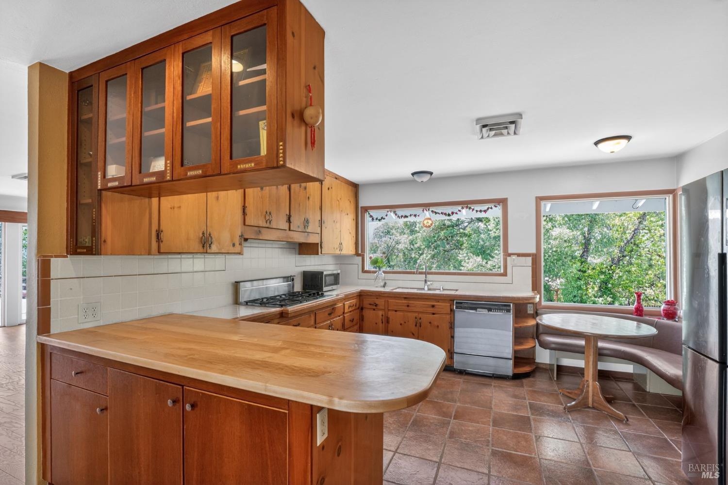 891 Isola Way Ukiah, CA 95482 - Photo 30 of 46 a kitchen with a sink and large window