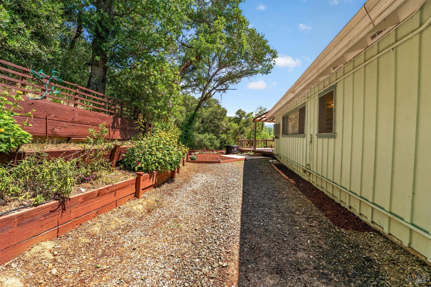 891 Isola Way Ukiah, CA 95482 - Photo 3 of 46 a view of a house with a yard