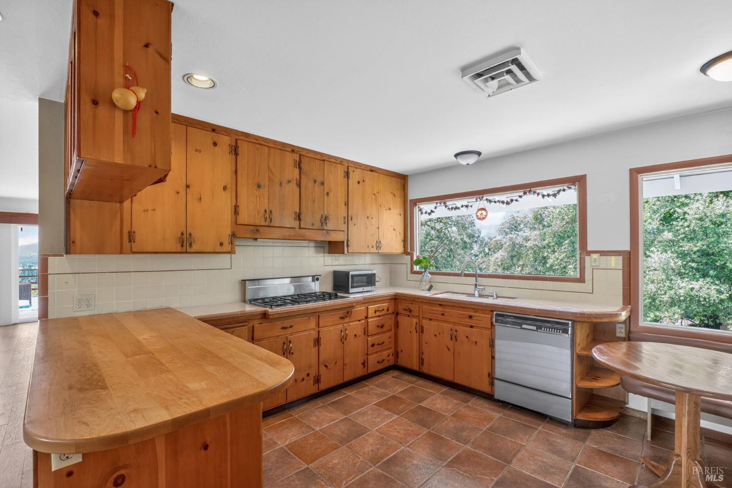 891 Isola Way Ukiah, CA 95482 - Photo 31 of 46 a kitchen with a sink and cabinets