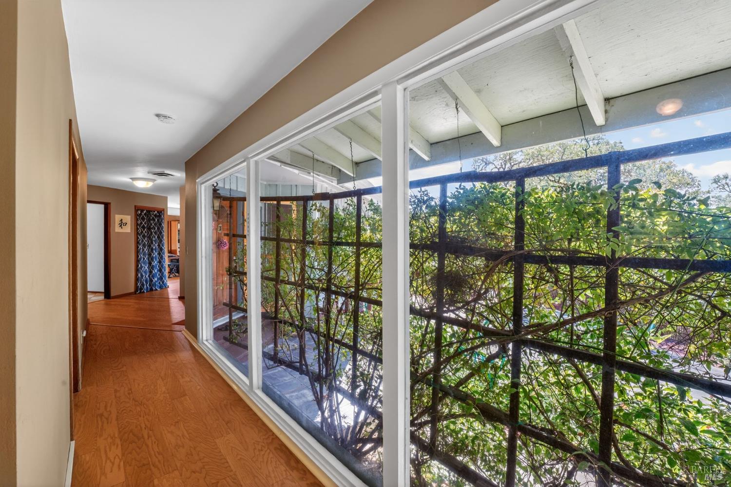 891 Isola Way Ukiah, CA 95482 - Photo 33 of 46 a view of hallway with wooden floor
