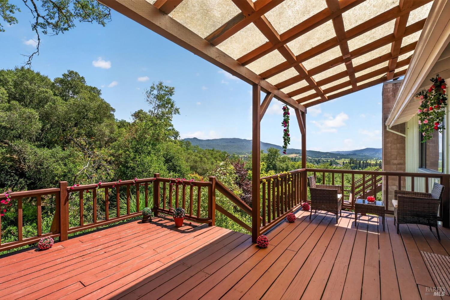 891 Isola Way Ukiah, CA 95482 - Photo 5 of 46 a view of balcony with wooden floor and iron fence