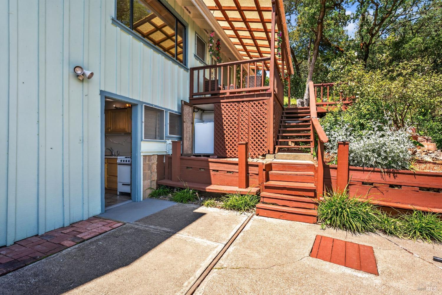 891 Isola Way Ukiah, CA 95482 - Photo 7 of 46 a front view of a house with a yard