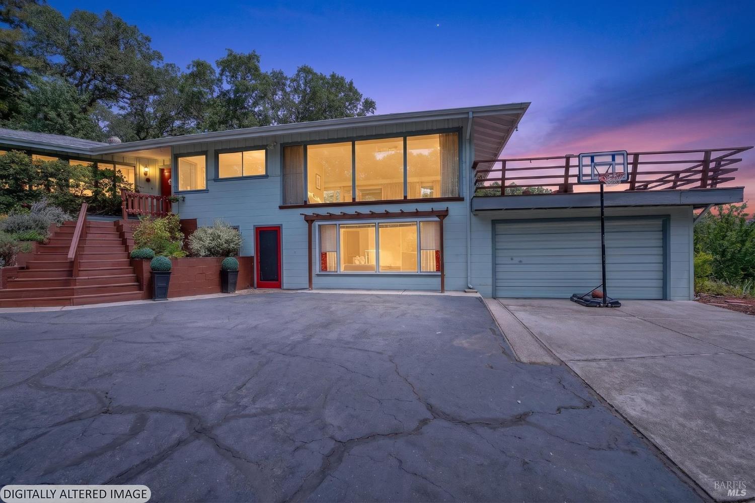 891 Isola Way Ukiah, CA 95482 - Photo 9 of 46 a view of a house with a garage