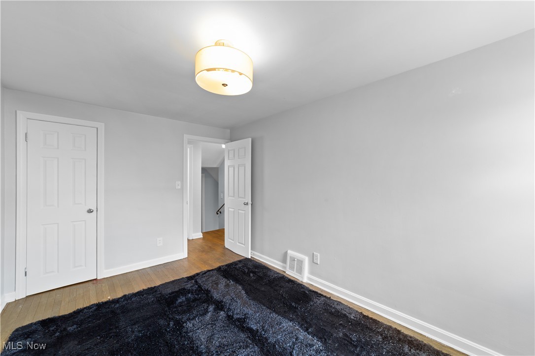 4249 Stonehaven Road Cleveland, OH 44121 - Photo 27 of 33 Unfurnished bedroom with hardwood / wood-style floors