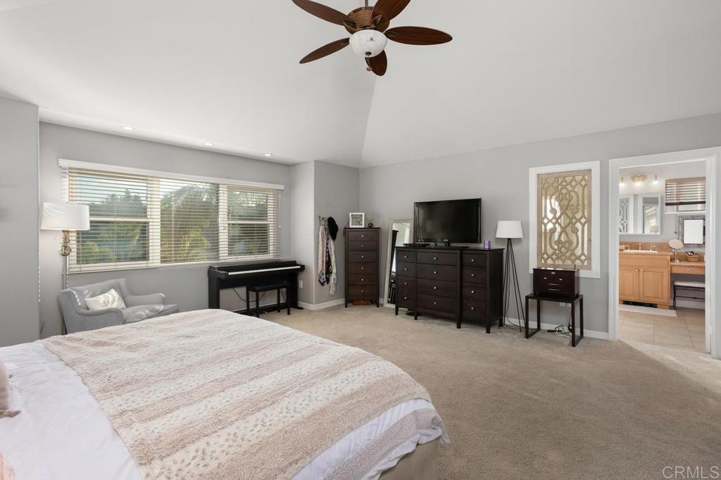 2804 Jacaranda Avenue Carlsbad, CA 92009 - Photo 26 of 36 a bedroom with a bed and a television