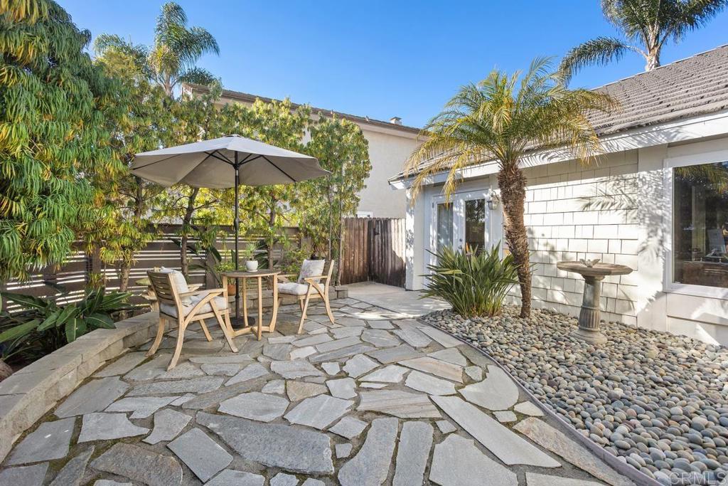 2804 Jacaranda Avenue Carlsbad, CA 92009 - Photo 3 of 36 a view of a chairs and table in patio with a fire pit