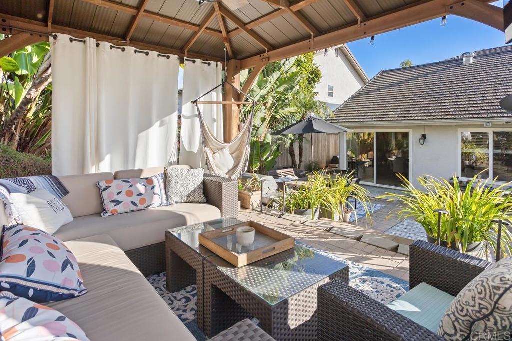 2804 Jacaranda Avenue Carlsbad, CA 92009 - Photo 35 of 36 a outdoor space with patio the couches and a potted plant