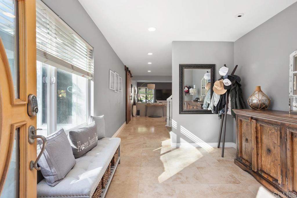 2804 Jacaranda Avenue Carlsbad, CA 92009 - Photo 5 of 36 a living room with furniture and a large window