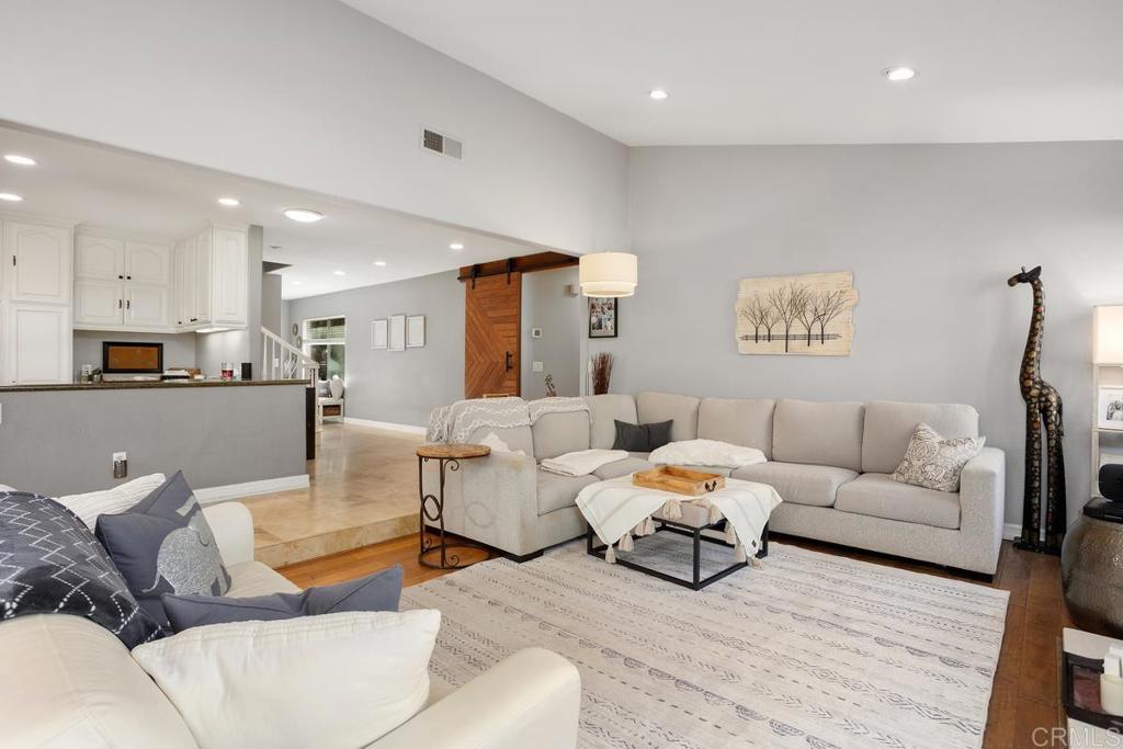 2804 Jacaranda Avenue Carlsbad, CA 92009 - Photo 7 of 36 a living room with furniture and a couch