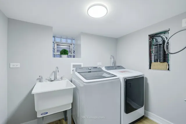 a utility room with dryer and washer