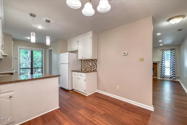 an empty room with a bathroom