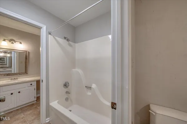 a bathroom with a sink and a vanity