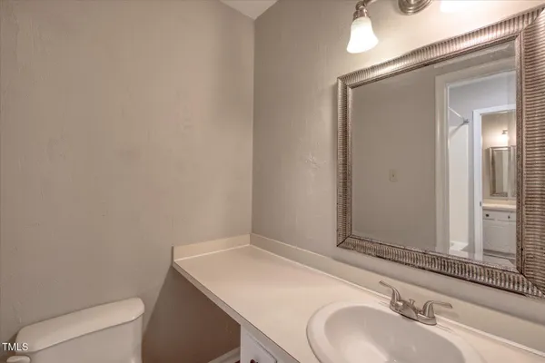 a bedroom with bed and window