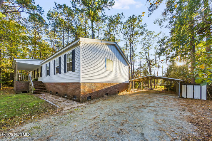 139 Sunset Avenue Merritt, NC 28556 - Photo 52 of 60 Side View