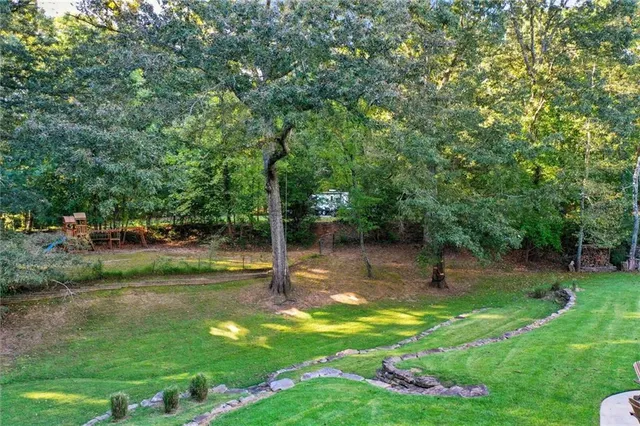 a view of a fire pit in a park