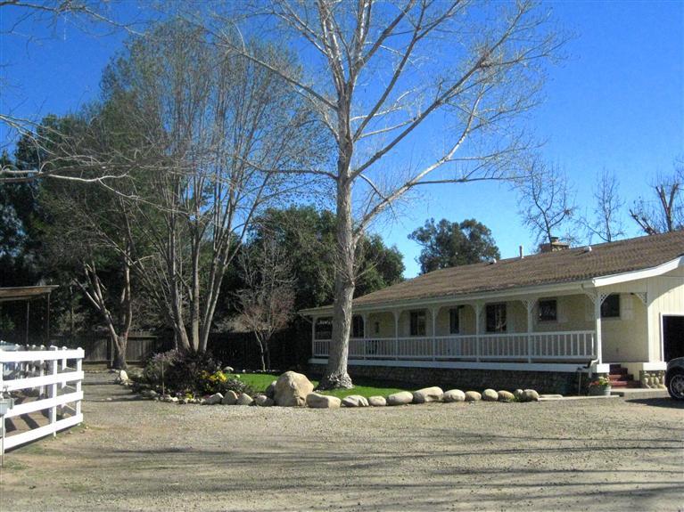 210 Burnham Road Oak View, CA 93022 - Photo 1 of 17 a front view of a house with a yard