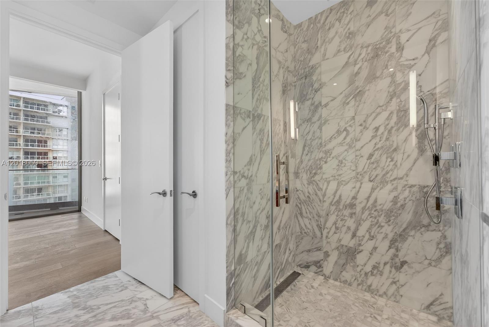 175 Southeast 25th Road, Unit 1004 Miami, FL 33129 - Photo 12 of 40 a bathroom with a shower