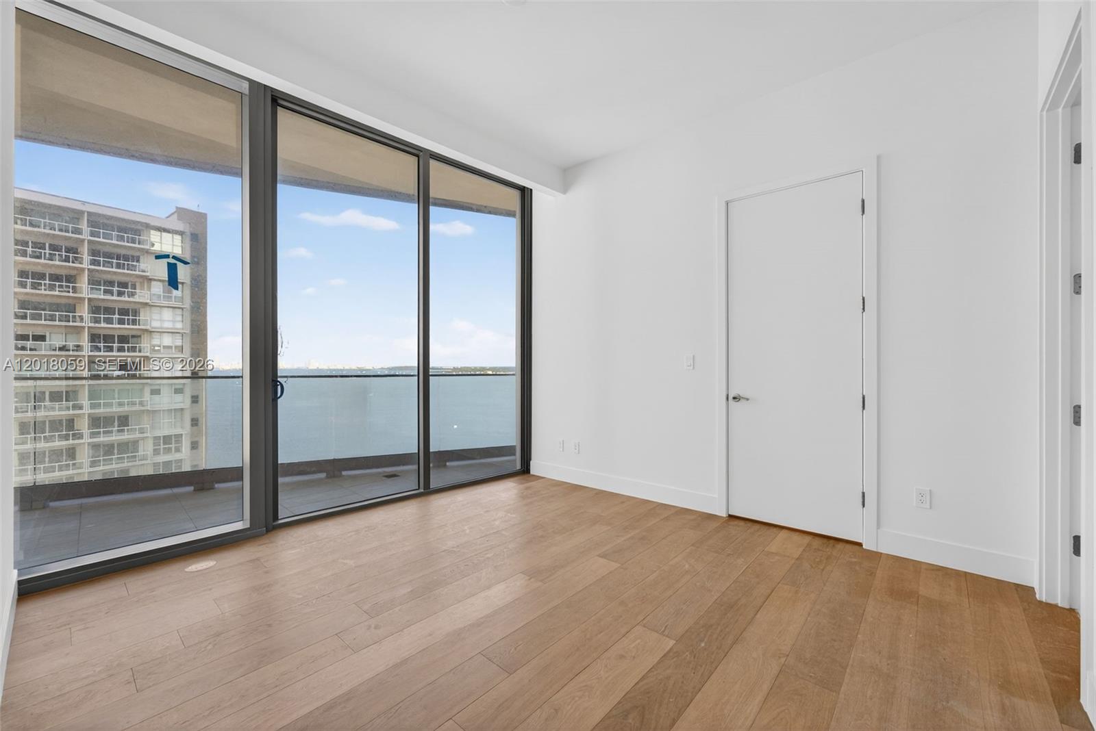 175 Southeast 25th Road, Unit 1004 Miami, FL 33129 - Photo 8 of 40 a view of an empty room with a window
