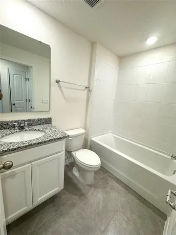 an empty room with closet area