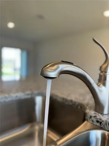 a bathroom with a toilet and a tub