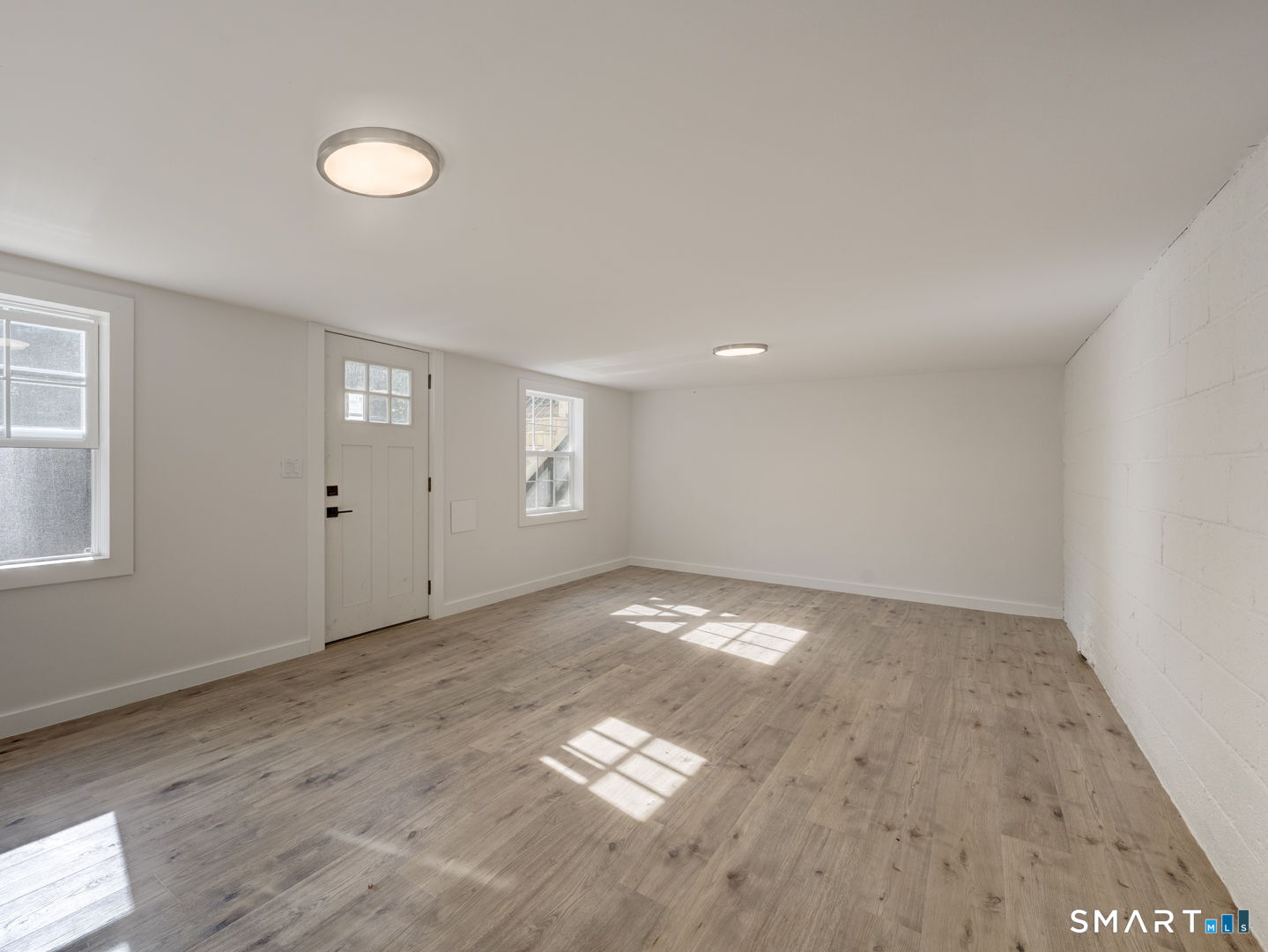 100 Wild Cat Hill Road Harwinton, CT 06791 - Photo 29 of 38 Finished walk out space on lower level