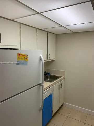 a swimming pool with outdoor seating and yard