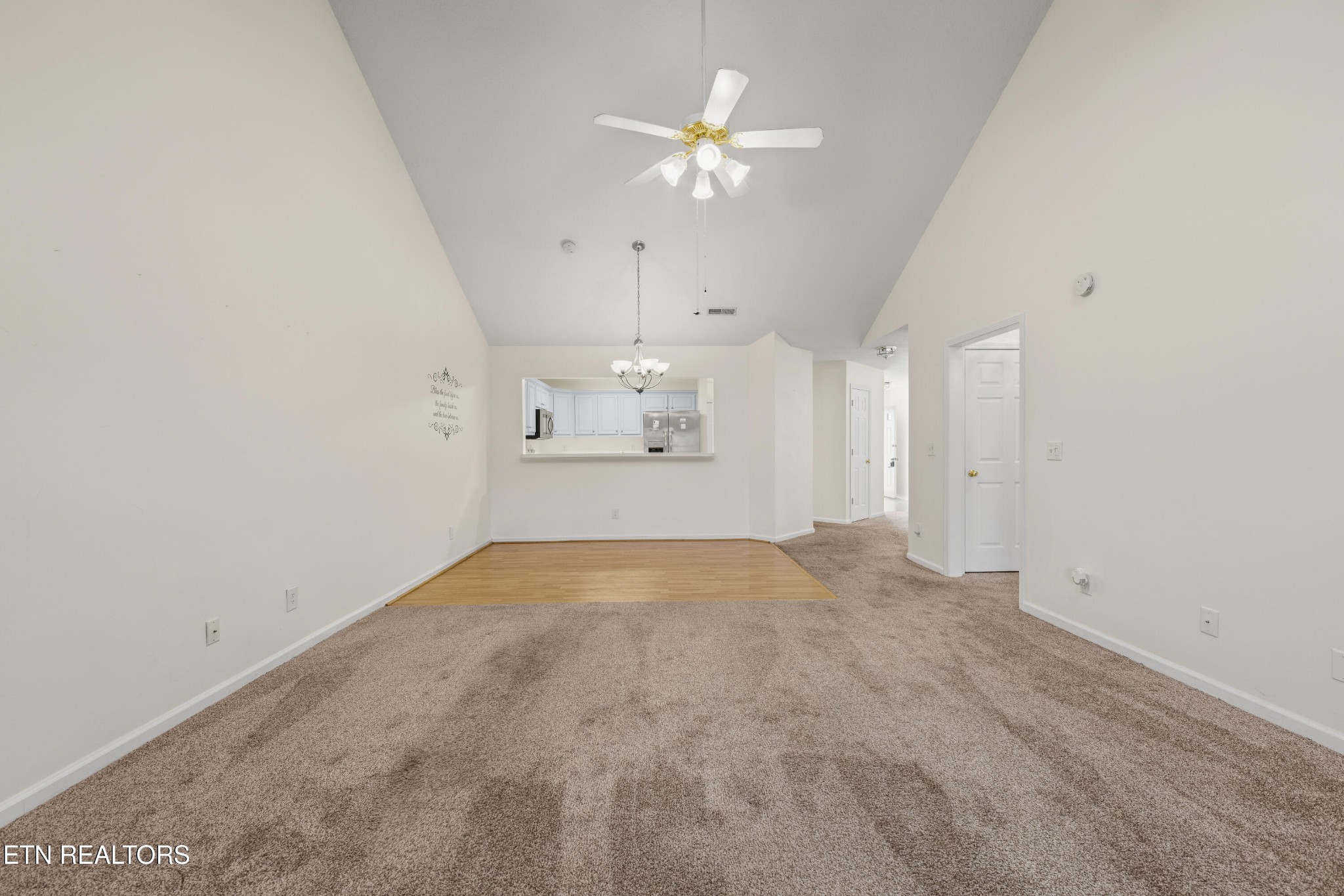 1218 Ernest McMahan Road Sevierville, TN 37862 - Photo 17 of 40 a view of an empty room with a ceiling fan