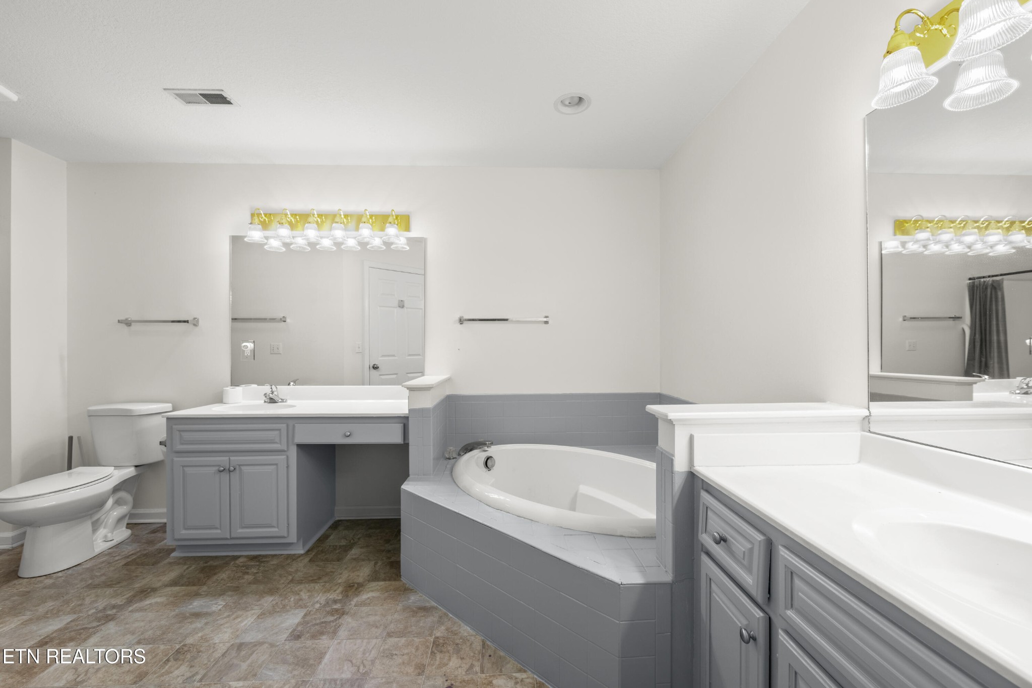 1218 Ernest McMahan Road Sevierville, TN 37862 - Photo 29 of 40 a bathroom with a sink and a bathtub
