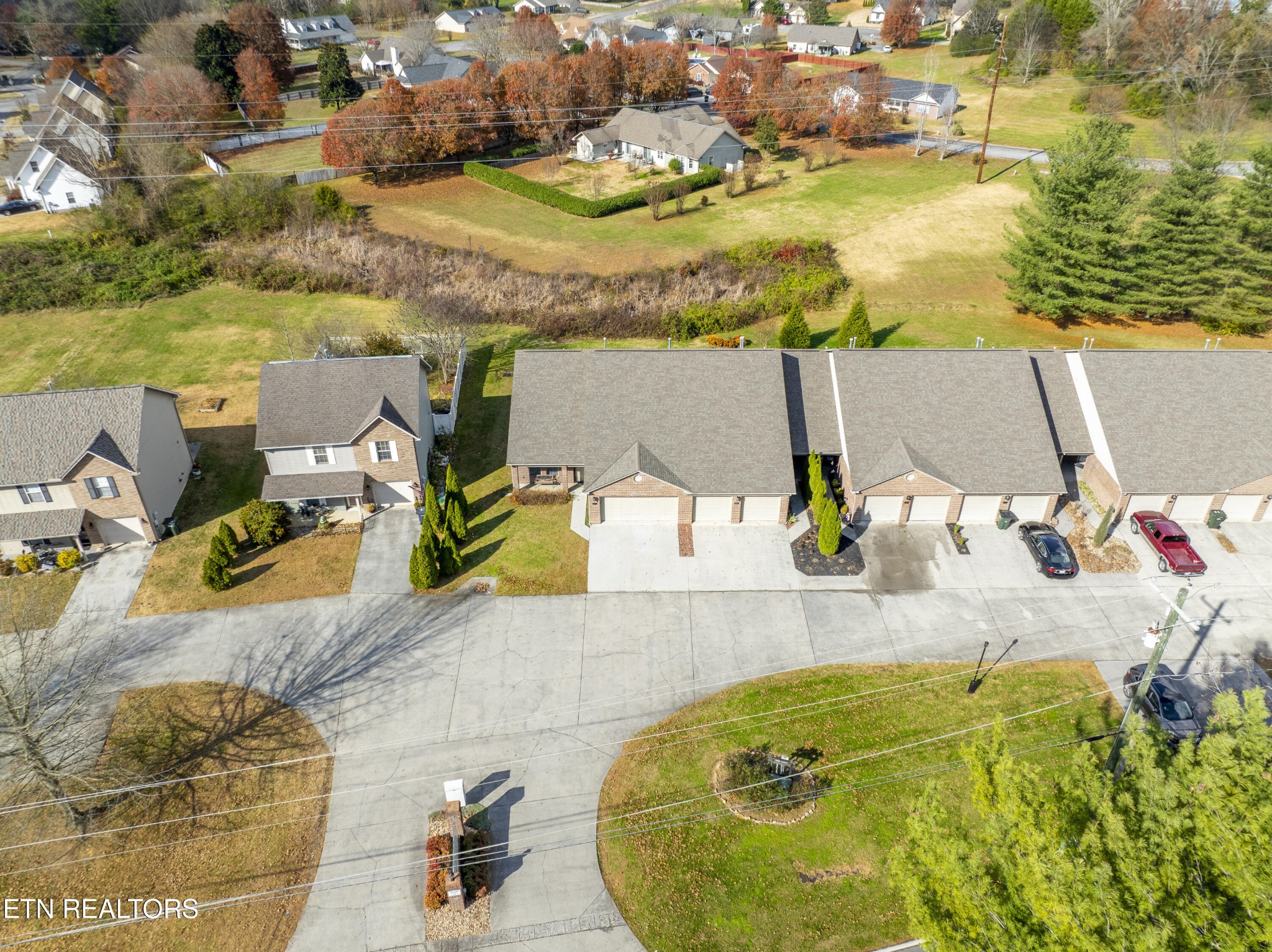 1218 Ernest McMahan Road Sevierville, TN 37862 - Photo 33 of 40 an aerial view of a house with a swimming pool