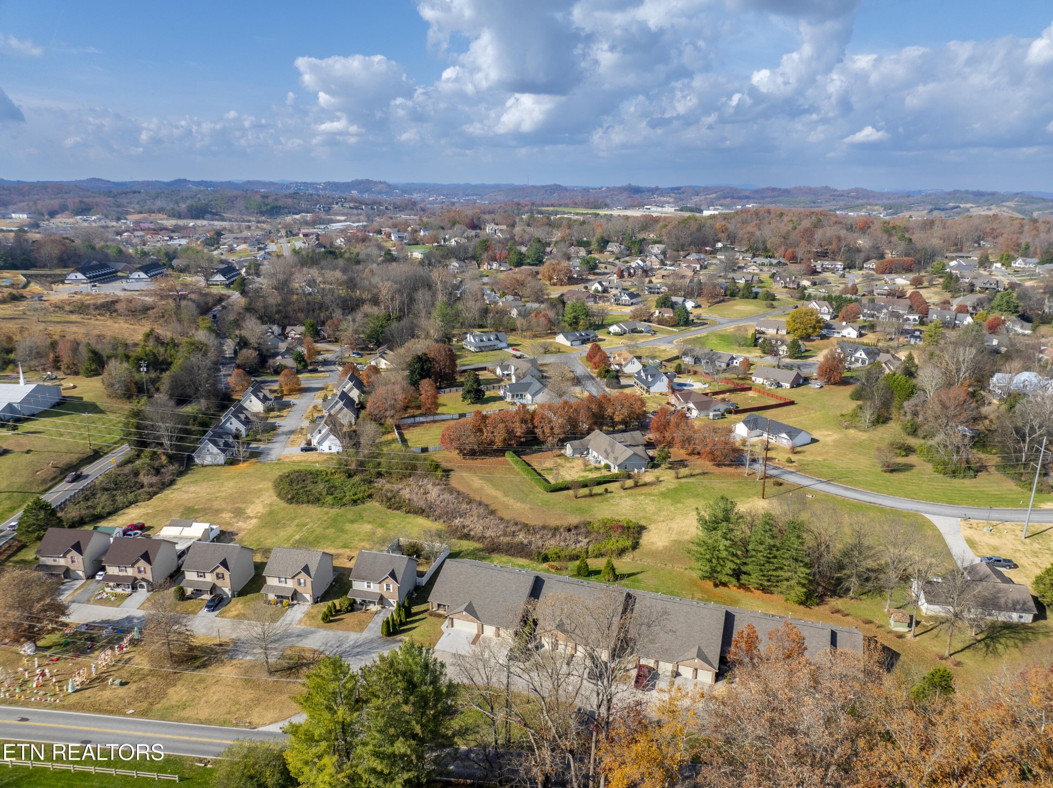 1218 Ernest McMahan Road Sevierville, TN 37862 - Photo 38 of 40 an aerial view of residential houses with outdoor space