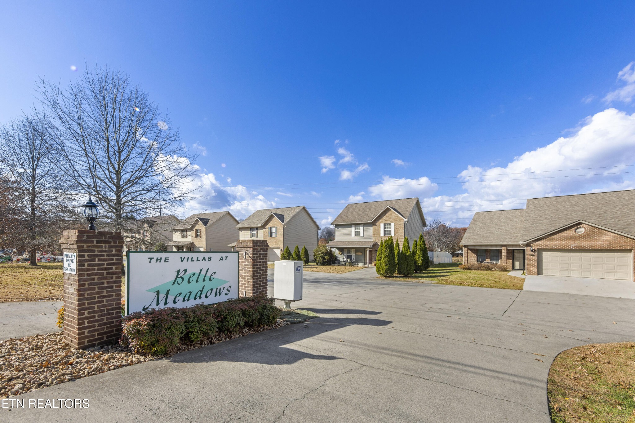 1218 Ernest McMahan Road Sevierville, TN 37862 - Photo 4 of 40 a view of a street with a building in the background