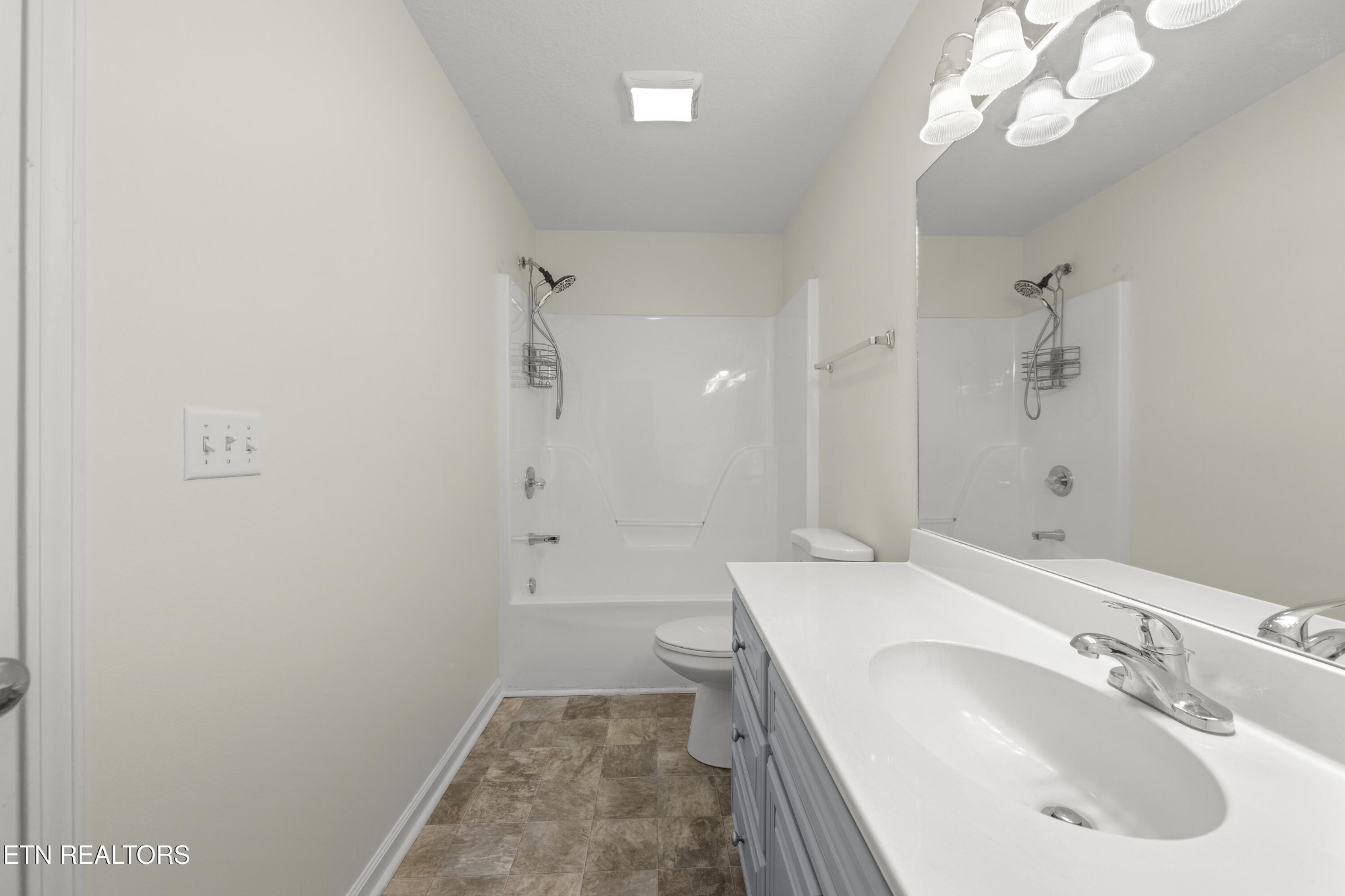1218 Ernest McMahan Road Sevierville, TN 37862 - Photo 8 of 40 a bathroom with a sink a toilet and shower