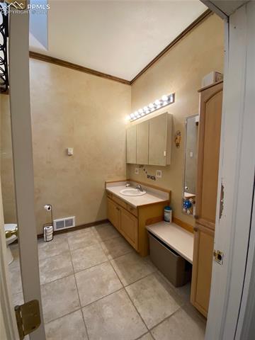 39820 Big Springs Road Rush, CO 80833 - Photo 20 of 28 3/4 Bath with Linen Closet Cabinet