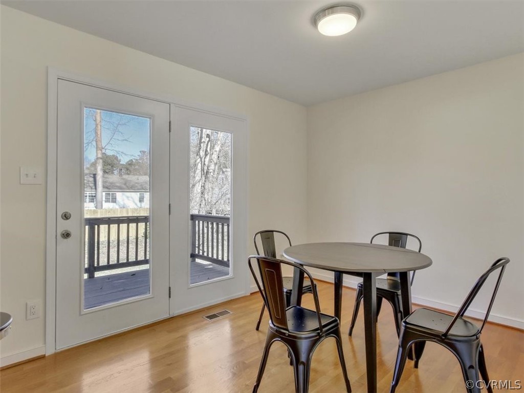 4100 Kings Gate Road Chester, VA 23831 - Photo 8 of 25 a view of a dining room with furniture and wooden floor