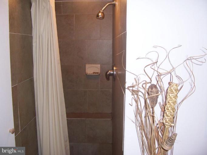 53 Kinship Road Dundalk, MD 21222 - Photo 14 of 17 a bathroom with a shower