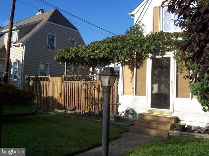 53 Kinship Road Dundalk, MD 21222 - Photo 3 of 17 a front view of a house with garden